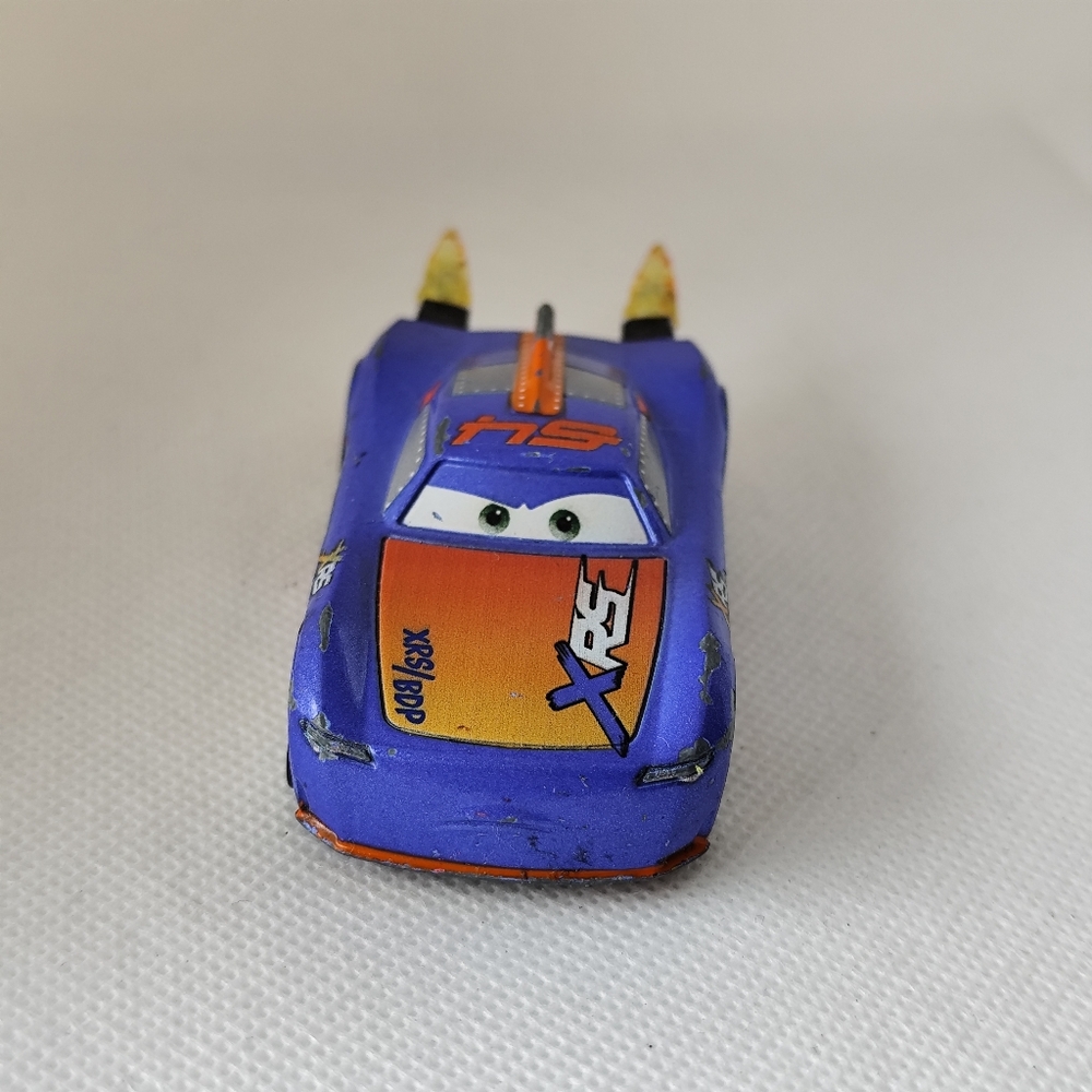 3/$25💙DISNEY Rocket Racing Disney Cars 1/55 WITH BLAST WALL BARRY DEPEDAL